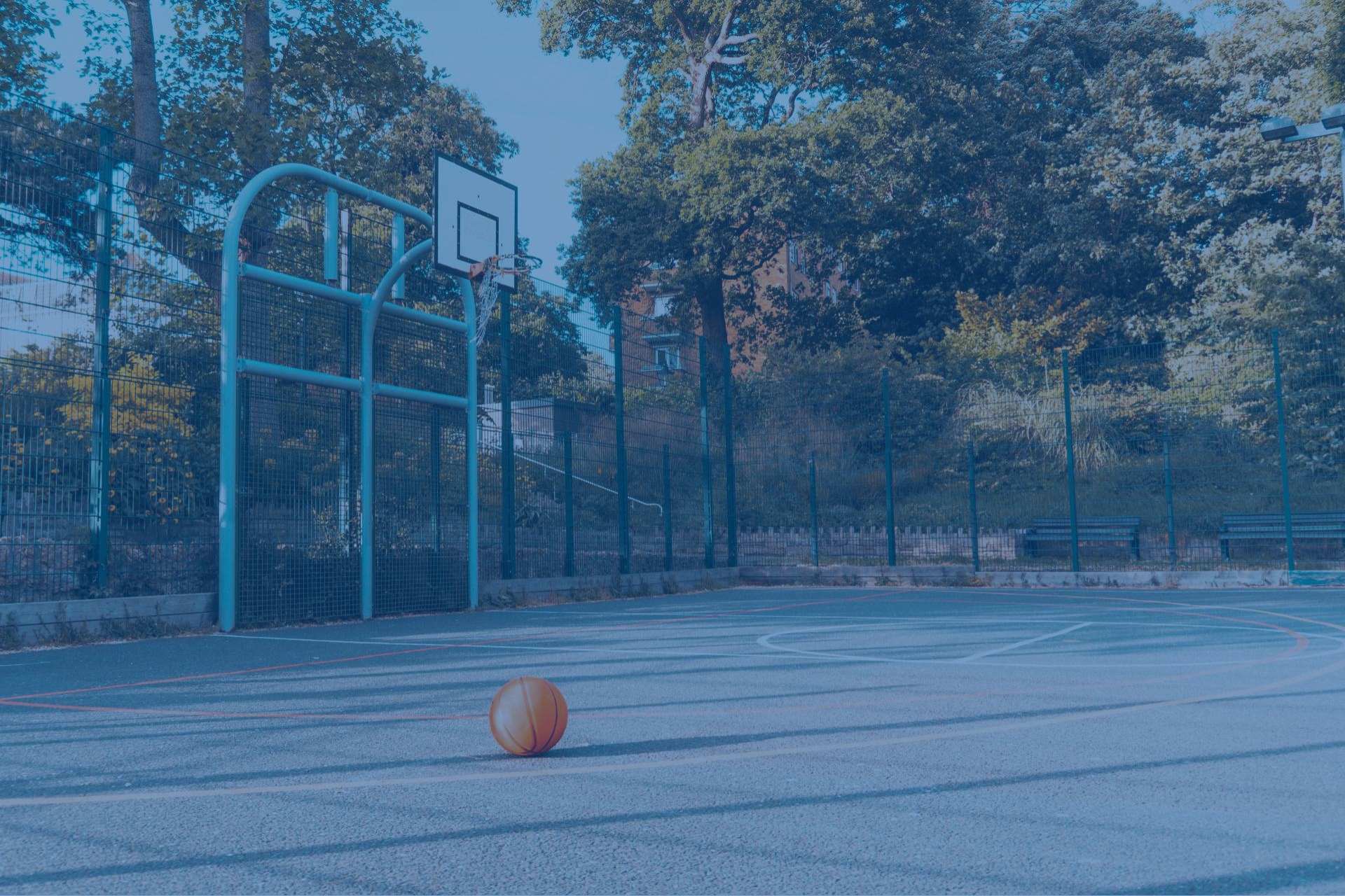 Recently cleaned basketball court | Featured image for the Basketball Court Cleaner page from MKL Pressure Cleaning.