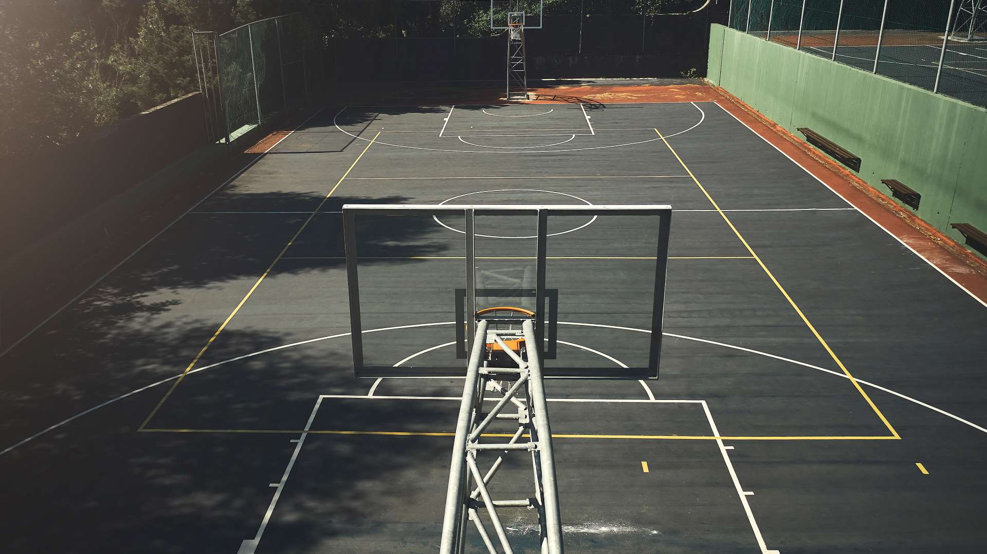 Recently cleaned basketball court | Featured image for the Basketball Court Cleaner page from MKL Pressure Cleaning.