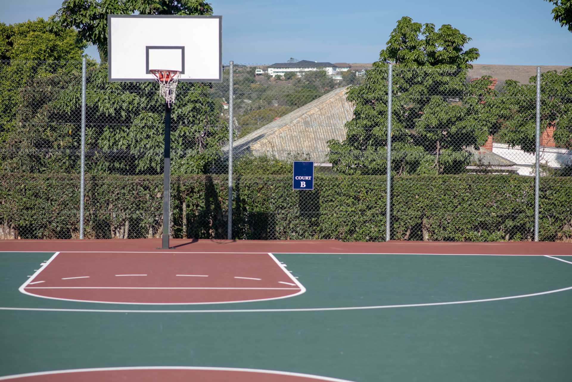 Empty basketball court | Featured image for the Basketball Court Cleaner page from MKL Pressure Cleaning.