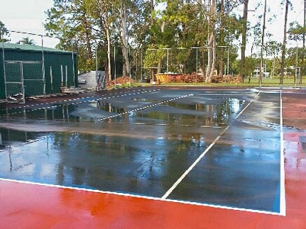 Before image of a netball court cleaning taking place | Featured image for the Netball Court Cleaning page from MKL Pressure Cleaning.